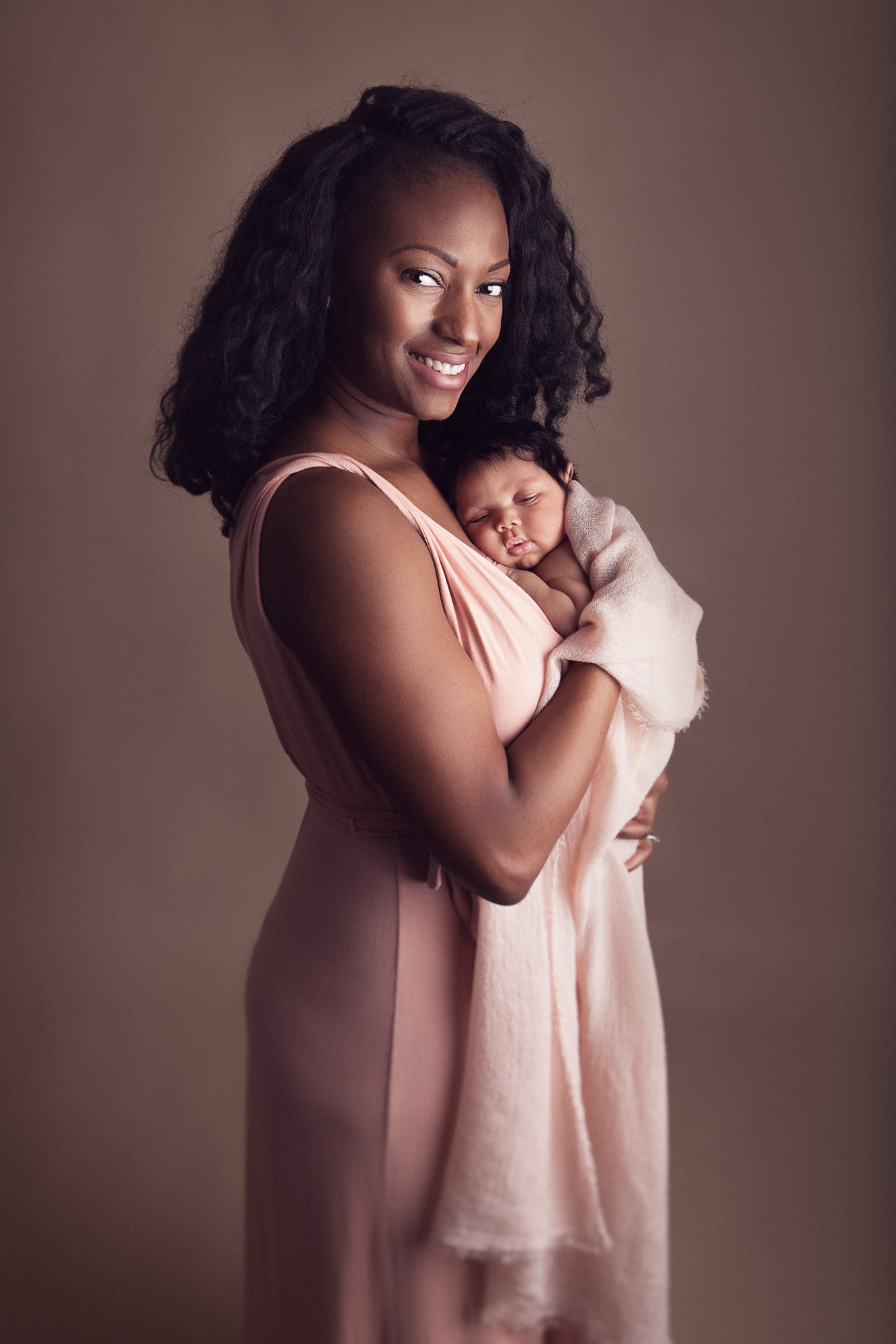 Mommy and baby studio portrait