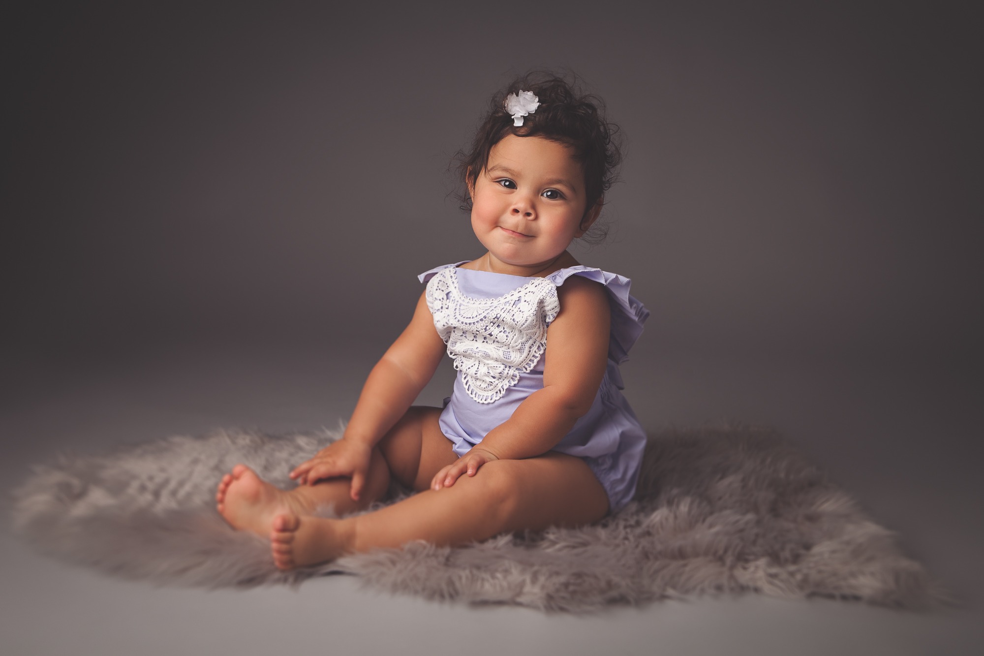 Smiling baby girl during a Baltimore milestone portrait session