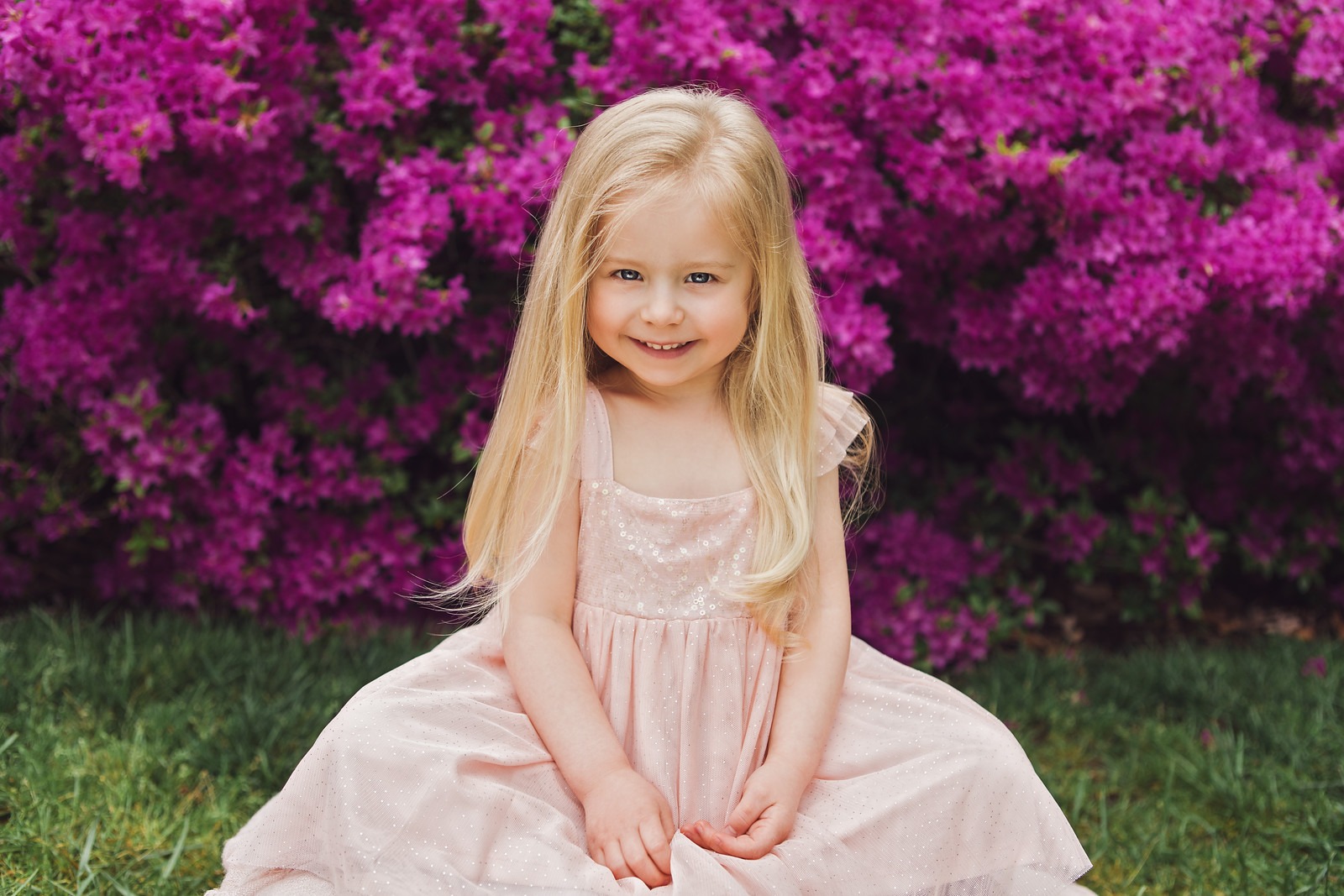 Girl in front of Azalea Flowers in Sherwood Gardens