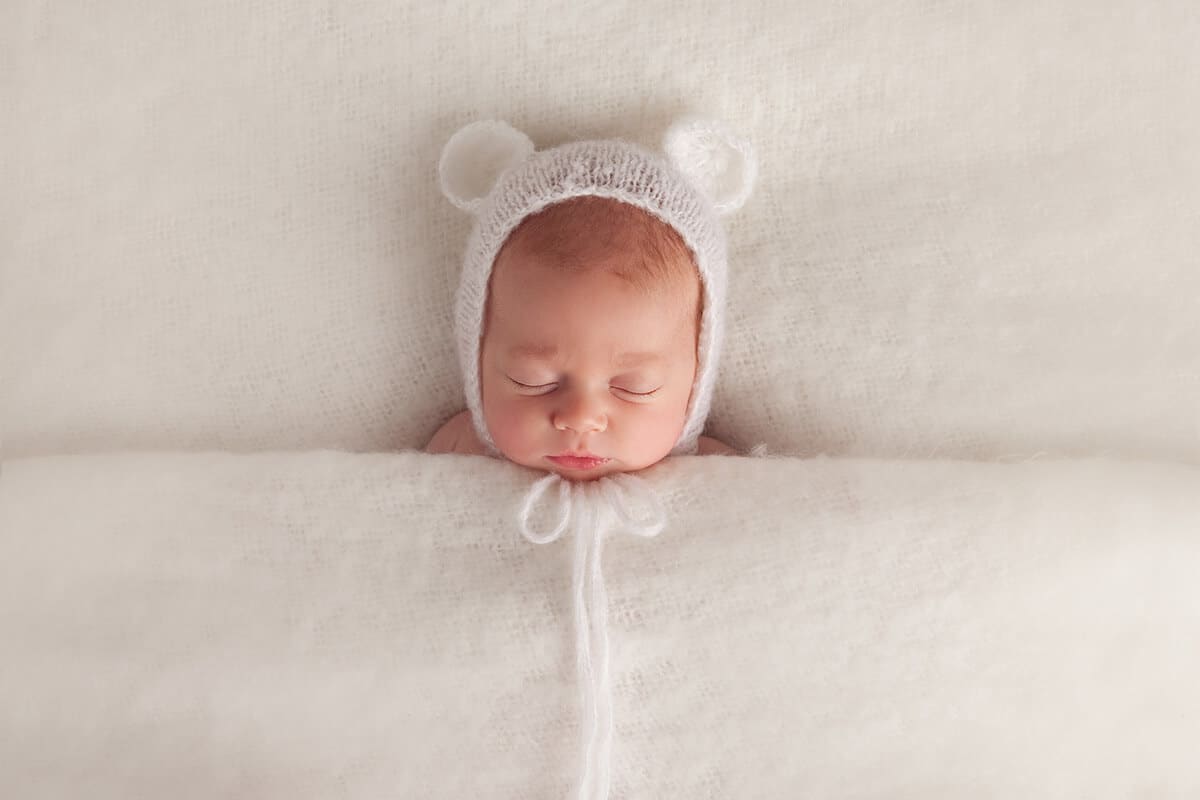 Newborn baby sleeping at photo shoot in Baltimore, Maryland