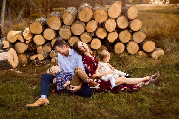 Lying down while posing for family photos