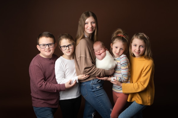 Side-by-side posing for family photos
