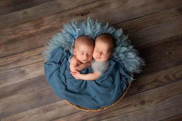 Twin newborn photography Baltimore - two babies in blue basket prop