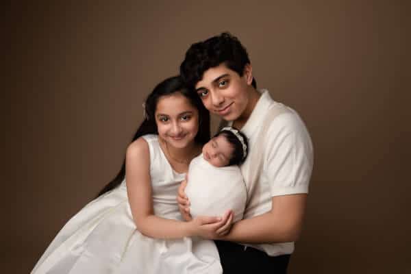 Newborn photos with siblings