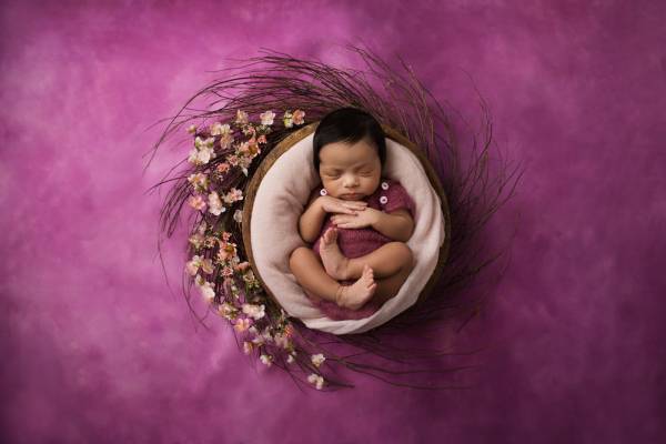 Posed newborn photo from a Fells Point family's studio session