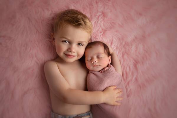 Newborn baby with older sibling, Guilford family session