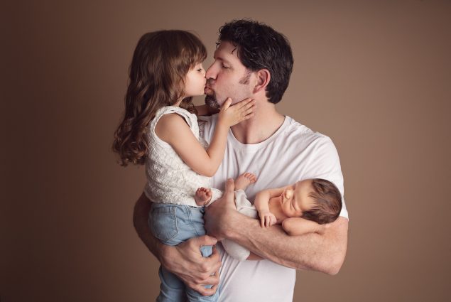 Dad and daughters professional studio portrait