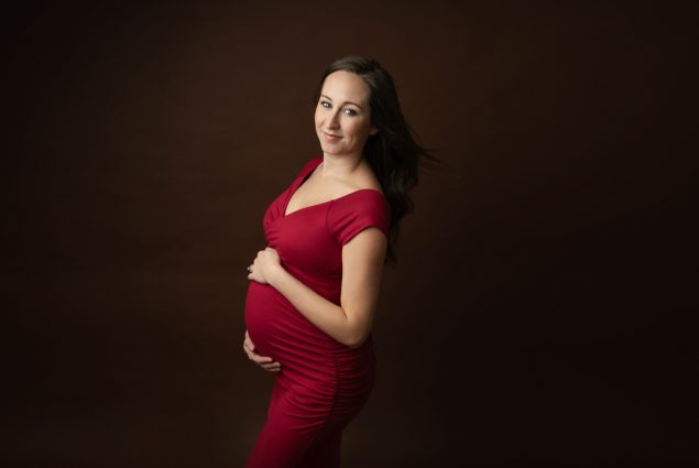 flattering maternity dress silhouette defining the baby bump