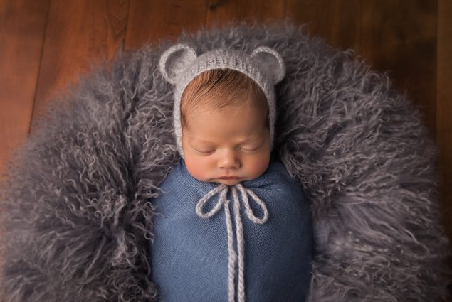 Newborn posing in Maryland studio
