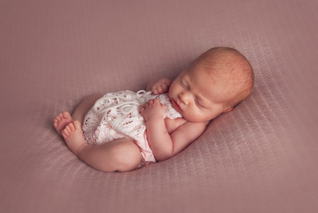 Newborn sleeping in a studio session