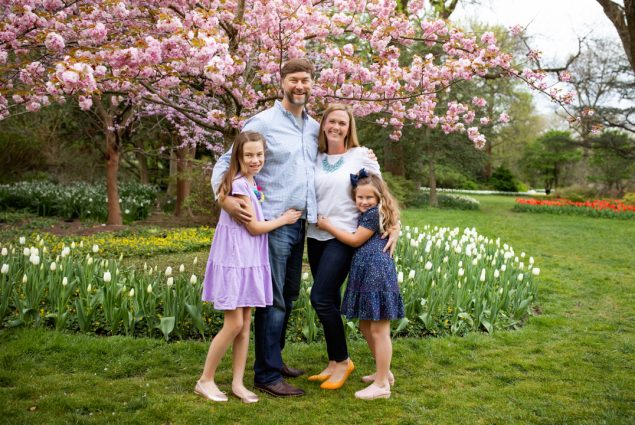 Professional portrait family of father mother two daughters