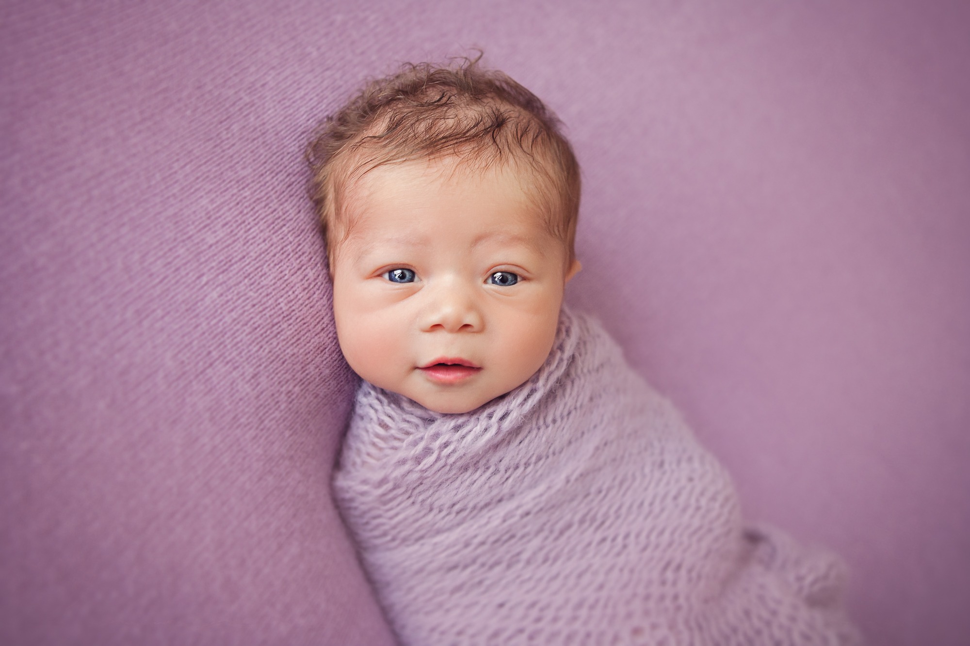 Blue eye baby girl posing