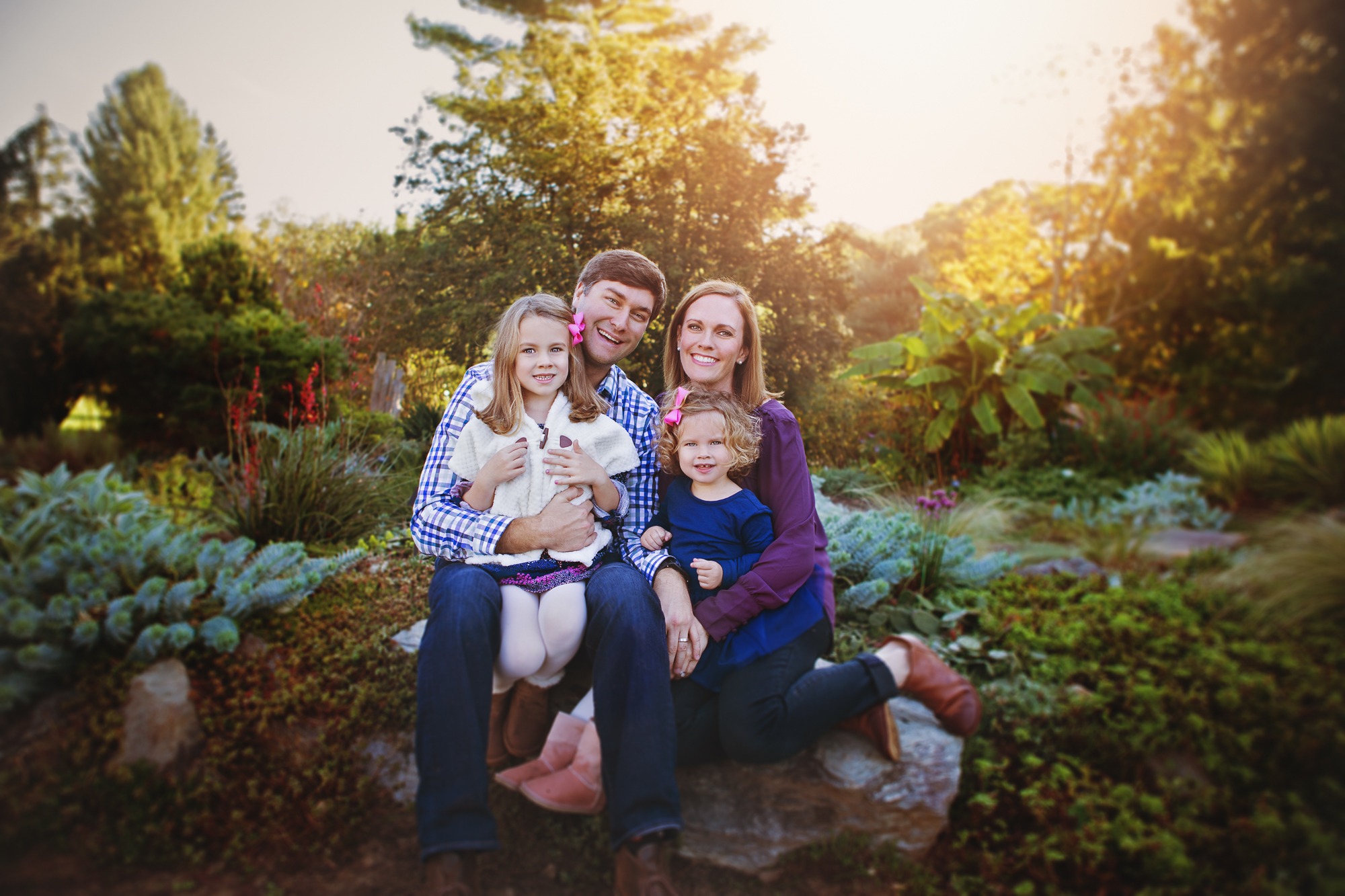 Family of four in nature