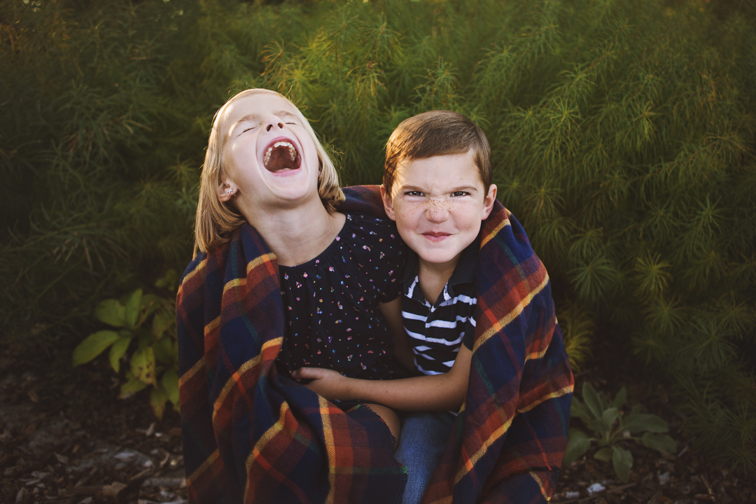 funny portrait of brother and sister