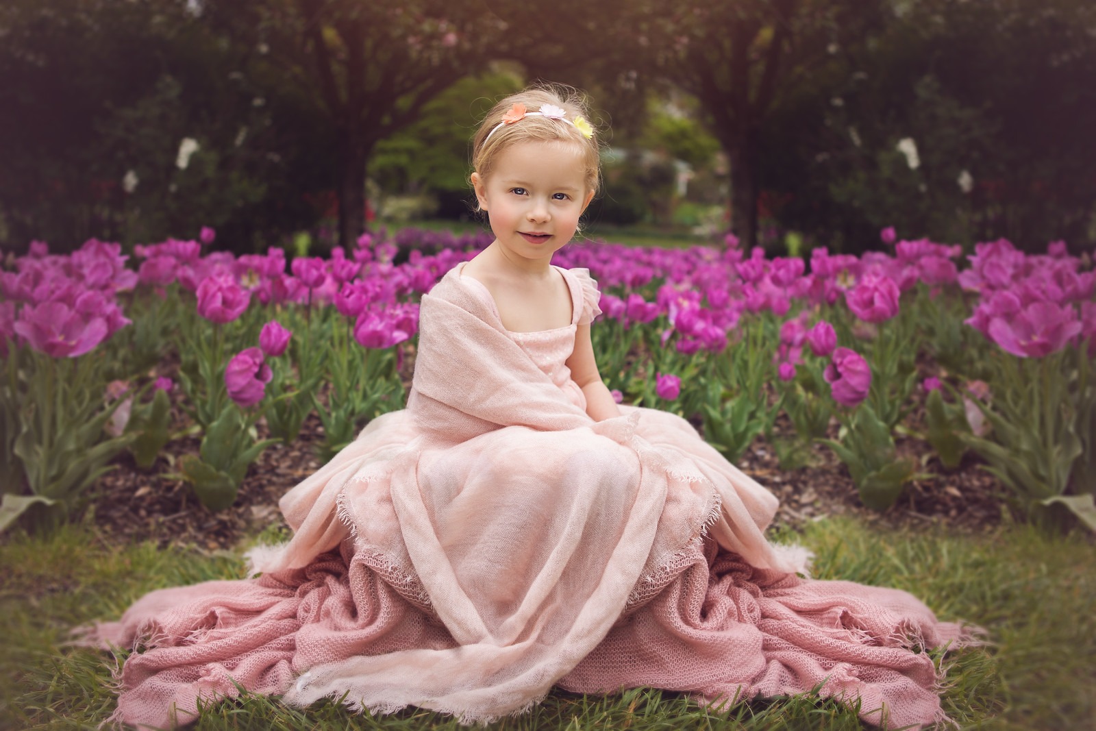 Girl in Pink posing in Sherwood Gardens