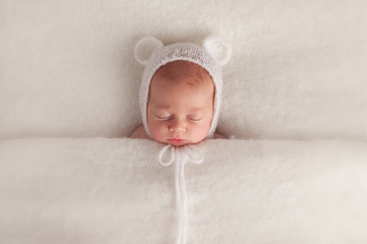 Newborn baby sleeping at photo shoot in Baltimore, Maryland