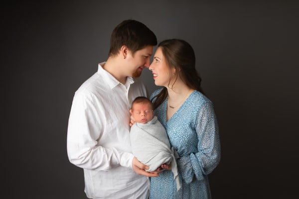 Family poses with baby