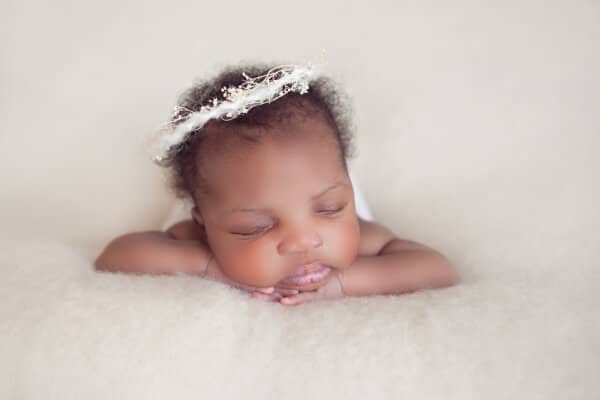 beautiful styled portraits of newborn in studio