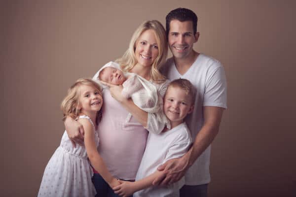 Newborn family photo outfits for studio sessions