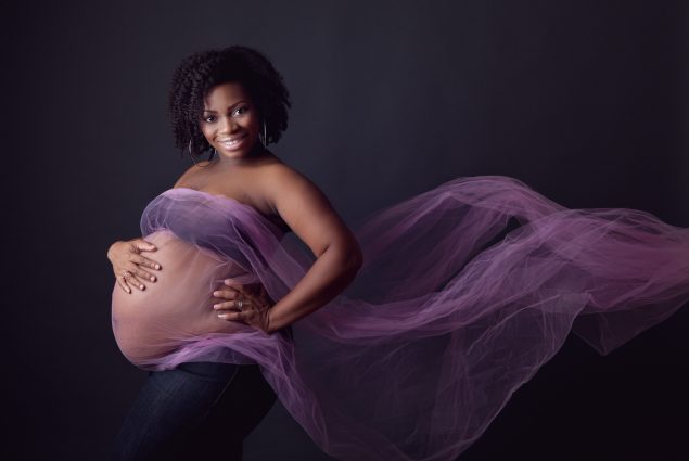 Pregnancy studio session in purple