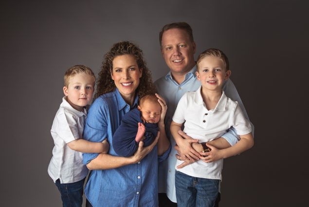 Professional studio portrait of family of five