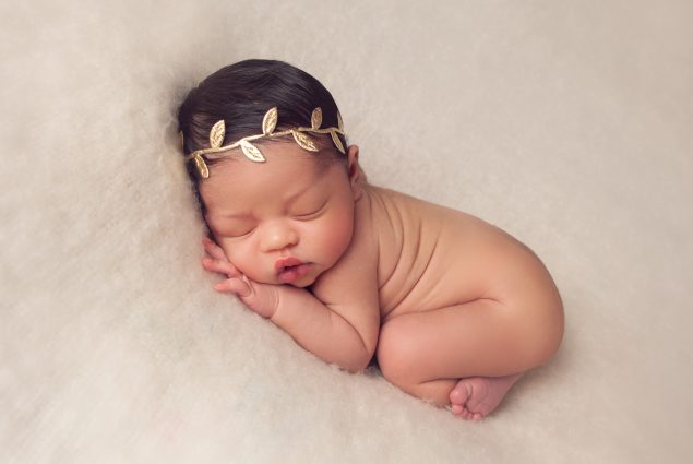 Simple newborn pose during a photoshoot